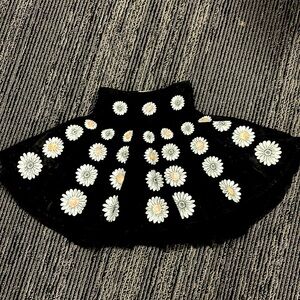 Precious black skirt with sequin daisies and built in petticoat.